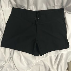 Nike women’s NWOT Dry-Fit black shorts. Size XL (16-18).  Drawstring waist.